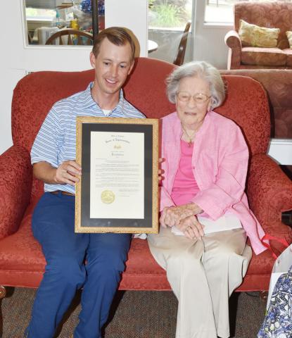 State Representative Kyle South is shown presenting Gwen Sanders with a resolution from the Alabama House of Representatives in recognition of her 100th birthday. She also received a similar resolution from the Fayette County Commission.