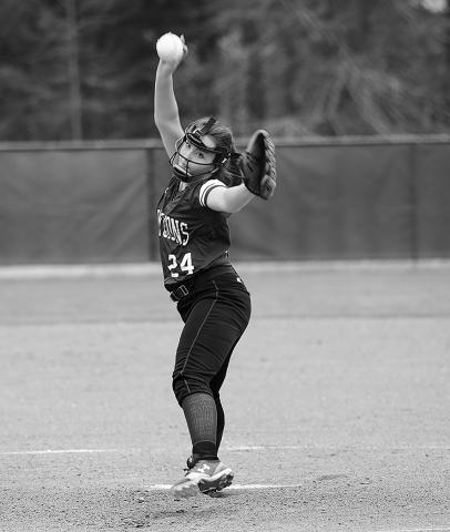 Dixie Moye is shown pitching for the Lady Lions. 