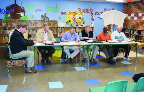 Shown at the Nov. 12 meeting of the Fayette County Board of Education are, from left: Superintendent Jim Burkhalter, and board members: Tom Hubbert, Keith Madison, Tim Fields, John Stowe and Waldon Tucker. Absent from the meeting was Board Member Sam Sullivan. The meeting was held in the Fayette Elementary School Library.