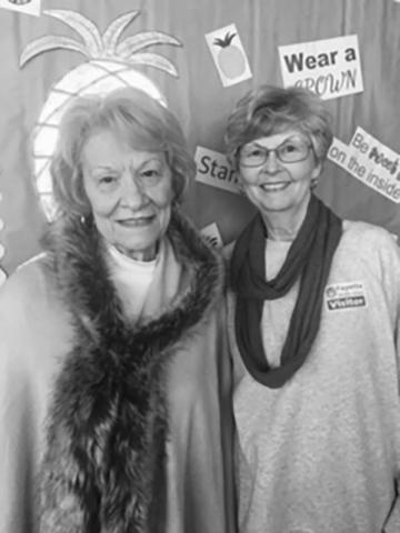 Shown from left are Susan Newman and Judy Godfrey, art instructor volunteers at FMS.