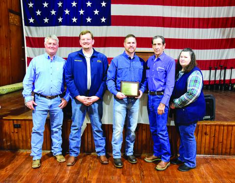 Pictured from left are: Jimmy Trice, Brad Cox, Cattleman of the Year Jarod Long, Fayette County Cattlemen Association President Charlie Dale Jones and Laura Rainey during the association’s annual banquet.