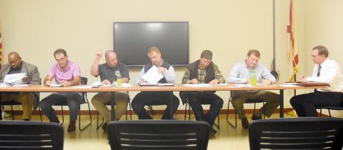 Pictured at the Nov. 28 Fayette County Commission meeting, from left: Commissioners John Underwood, David Hubbert, Wesley Jacobs, Robert Townley, Shane Hughes, Brad Cox and Commission Chairman Mike Freeman.