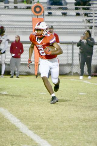 Berry’s Drayke Parr carries the ball for the Wildcats. The junior finished with 7 receptions for 84 yards along with 75 yards on the ground from 5 carries. 