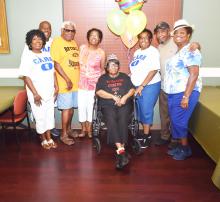 Helping celebrate her special day, shown from left are: Lenora Carr, Wilbert Carr, James Moore, Hariette Moore, Frances Carr, Marie Carr, Henry Carr and Birdie C. Young.