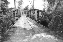 Shown is an old Pony Truss Bridge, which is located in Fayette County and still used for daily traffic.