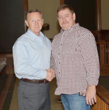 Mike Freeman (left) and Byron Yerby are shown congratulating each other on their victories in the general election.