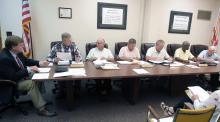The Fayette County Board of Education is shown having a discussion at its Sept. 12 meeting. From left: Superintendent Jim Burkhalter and board members Tom Hubbert, Sam Sullivan, Keith Madison, Tim Fields, John Stowe and Waldon Tucker.