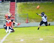 Bagwell is shown kicking an extra point this year against Sipsey Valley as Langston Strawbridge holds the ball.