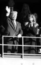 Shown are President Donald Trump and First Lady Melania Trump at the Alabama - LSU football game.