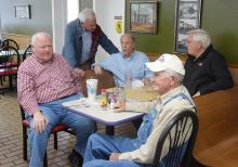 U.S. Congressman Bradley Byrne (standing) visited Fayette on Dec. 16 to discuss the 2020 U.S. Senate race. Shown sitting, clockwise from left: Fayette Co. Baptist Association Director John Killian, Reg Harris, Fayette Mayor Ray Nelson and Bob Musgrove.