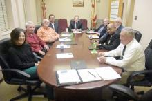 Shown at the Dec. 9 meeting of the Fayette County Commission, clockwise from left: Recently-hired County Administrator Brooke Slatton, Commissioner Billy Joe Rodgers, Commissioner James Knight, Commissioner Shane Hughes, Commission Chairman Mike Freeman, County Attorney Allen Grocholski, Commissioner Joe Acker, Commissioner John Underwood, and Commissioner Barry Corkren. Not pictured, but present at the meeting is current County Administrator John Gordon.