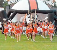 Football returned to the county schools in August, with the Fayette Tigers under the direction of new head coach Bill Smith.