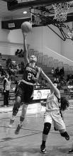 McKenna Fisher is shown shooting a layup for Hubbertville.