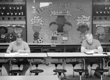 Shown are Fayette County Board of Education members Keith Madison (left) and Tim Fields (right) as they practice social distancing at the April 21 board meeting.