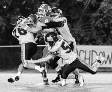 Alex Barnes (76), Jagger Youngblood (51), and Dawson Youngblood (60) are pictured recording a quarterback sack.