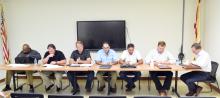 Pictured at the July 10 Fayette County Commissioner’s meeting, from left: Commissioners John Underwood, Wesley Jacobs, Robert Townley, David Hubbert, Shane Hughes, Brad Cox and Commission Chairman Mike Freeman.