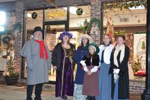 Pictured above are the carolers from last years’ event singing Christmas hymns and songs.