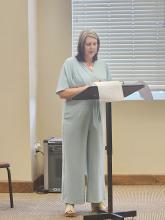 Transportation Director Jennifer Roberts presents the proposed 2027 transportation budget to the Fayette City Council in a public hearing on May 12. 