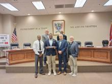 Fayette Junior Mayor Sean White was recognized during the July 14 Fayette City Council meeting as he concluded his service with the Junior City Council. White thanked city leaders for the opportunity to serve and encouraged continued support for the Junior City Council. Shown are (front, from left) Councilman Floyd Rodgers, White, Mayor Rod Northam and Councilman Mickey Joe Morgan; (back, from left) Councilman Tommy Williams and Councilman Cedric Wilson. 