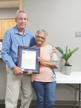 Glen Allen Mayor Allen J. Dunavant presents Councilwoman Cynthia Cowan with a framed letter of appreciation recognizing her service to the town. Cowan recently moved outside the town limits and will no longer serve in Council Seat 5. 
