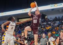 Cameron Pendley lays up a shot in the 1A Boys’ semifinals against R.C. Hatch High School on March 2 at Lecacy Arena in Birmingham. 
