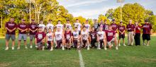 Members of the Hubbertville Lions baseball team show off their championship rings after being honored during a special pregame ceremony Aug. 28. The Lions received the rings in recognition of their 2025 AHSAA Class 1A state baseball championship.